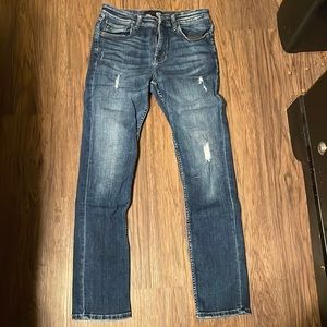 Men’s dark blue ripped jeans. Waist 30 x Length 32.